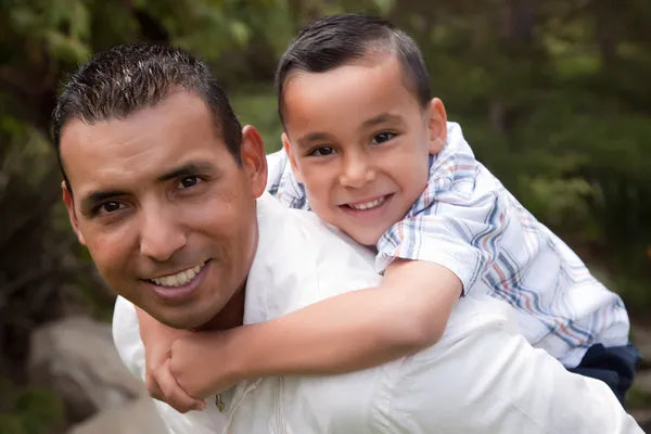 files/depositphotos_2347716-stock-photo-hispanic-father-and-son-having.webp